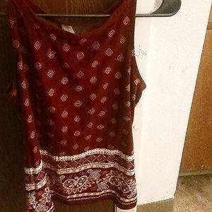 This is a patterned maroon NOBO tank top shirt, size M( 7-9)